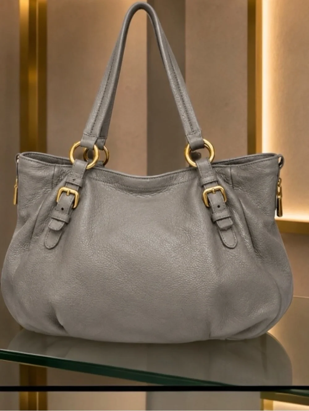 AUTHENTIC PRADA GUNMETAL & SHEEN DEERSKIN LEATHER SHOULDER BAG W/LUGGAGE TAG.